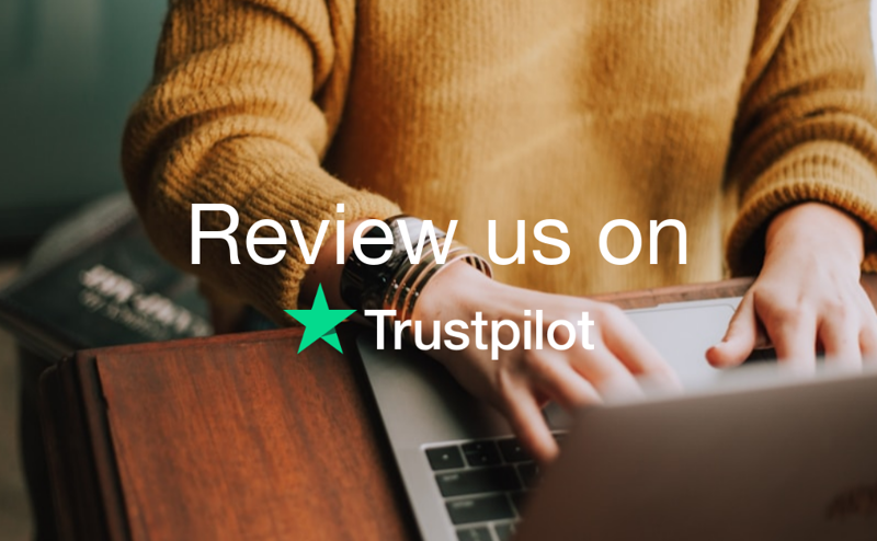 Person sat at laptop with Review us on Trustpilot title