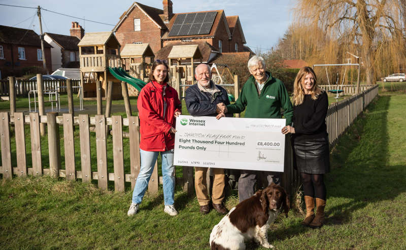 Giant cheque in front of Shroton playpark