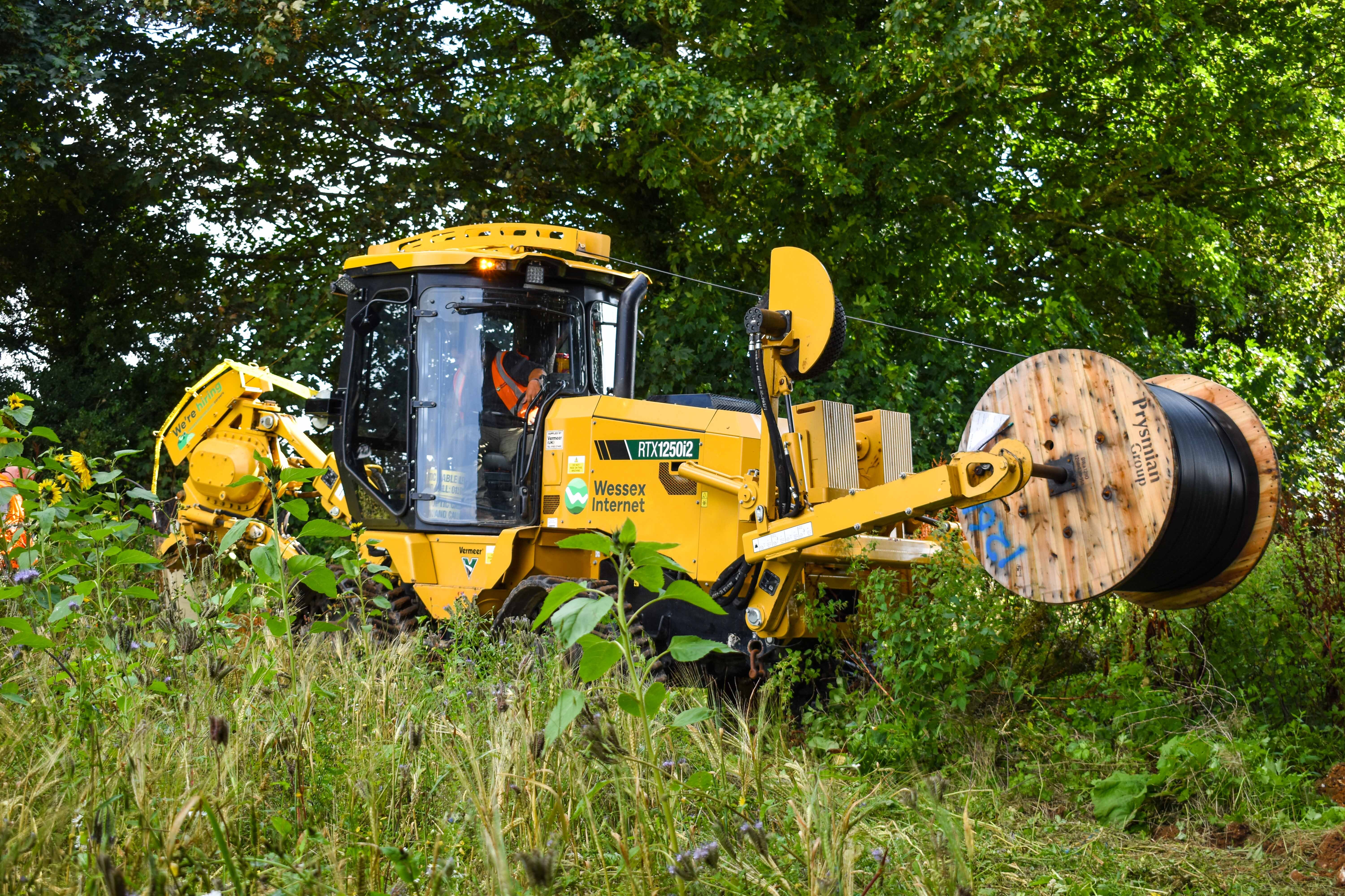 Mighty mole plough amongst long grass