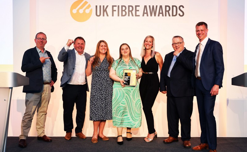 UK Fibre Awards presenters and Wessex Internet team with award