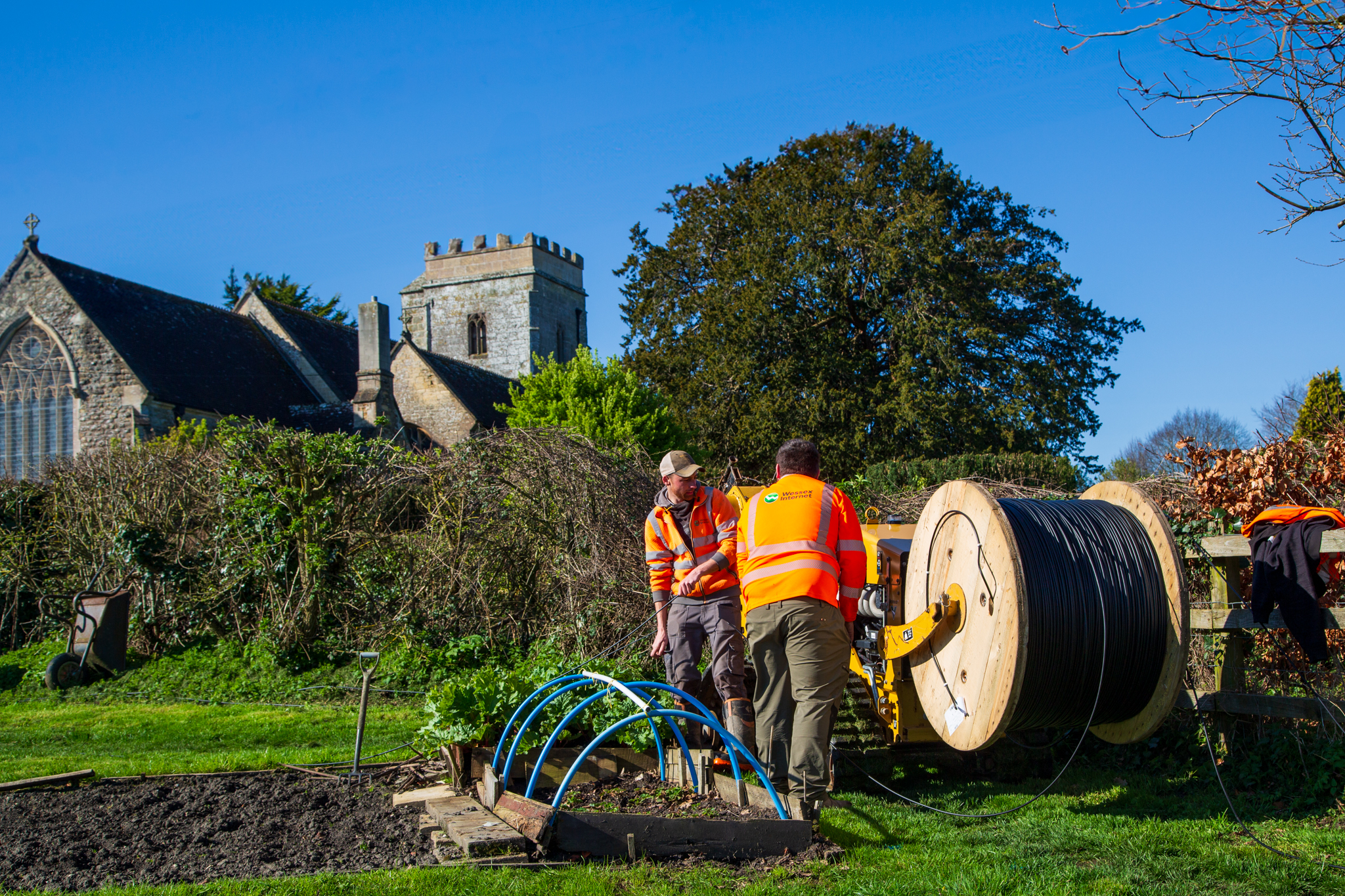 Garden works operatives with midi plough