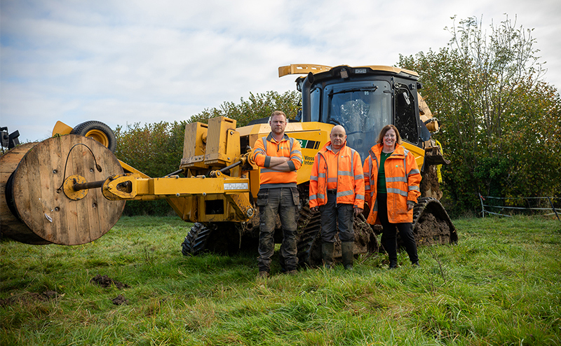 Wessex Internet team members in front of mole plough